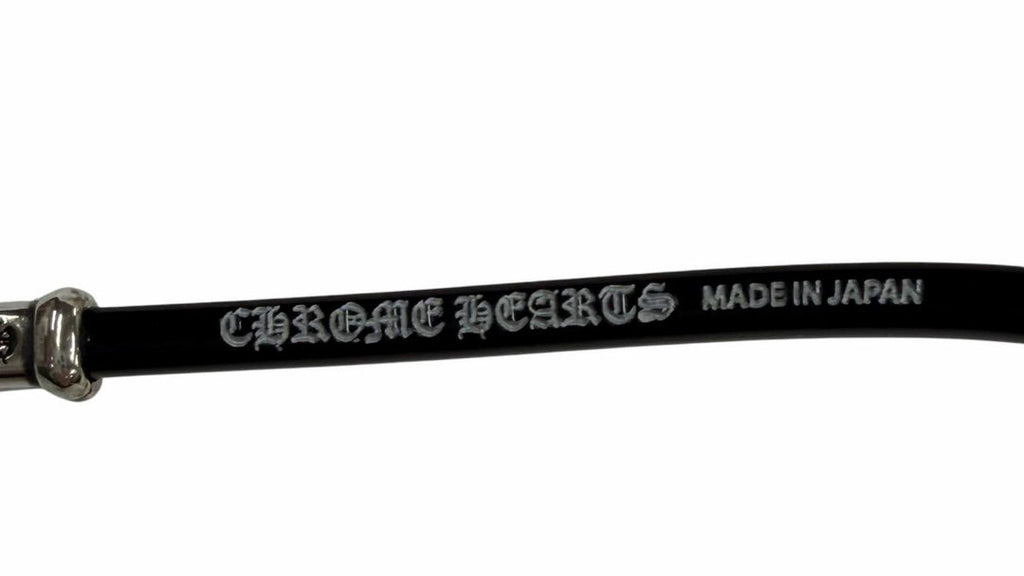 Black belt with 'Chrome Hearts' branding on a white background