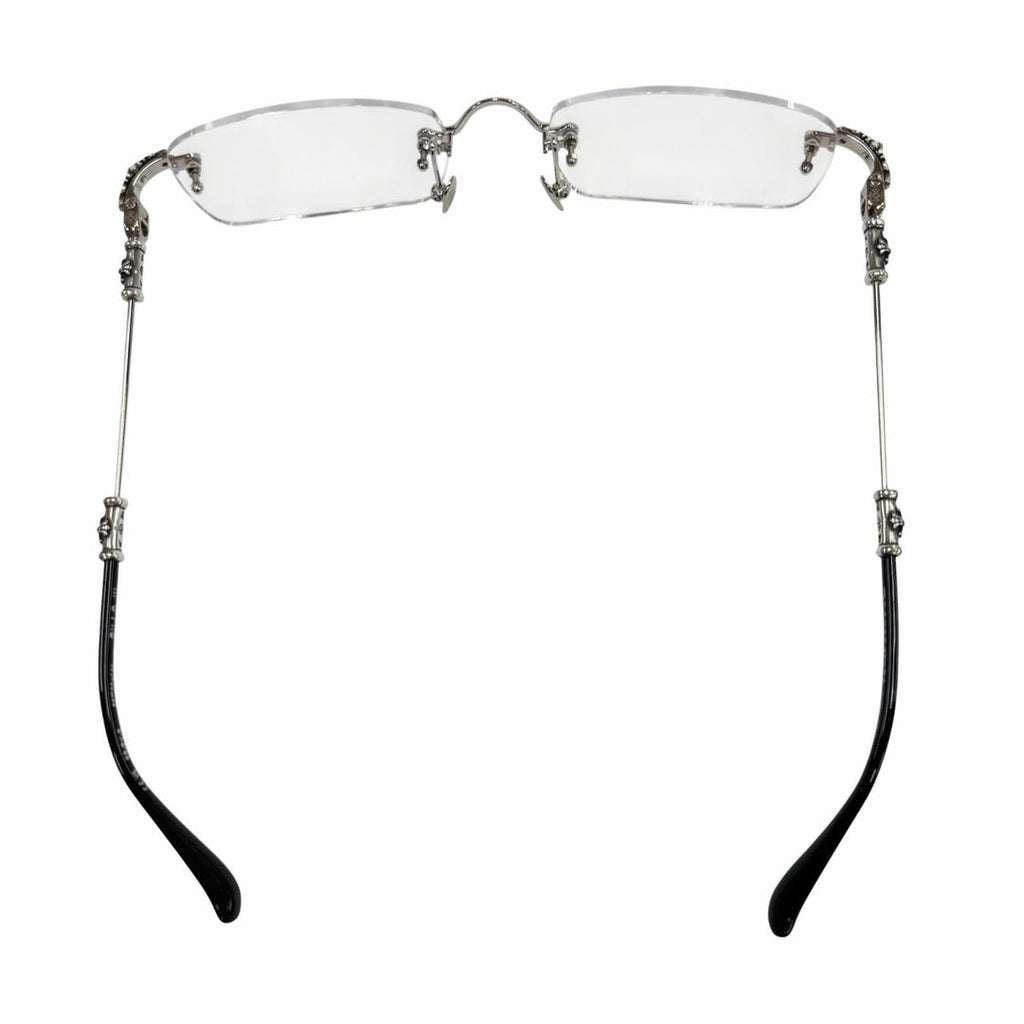 Eyeglasses with decorative arms on a white background