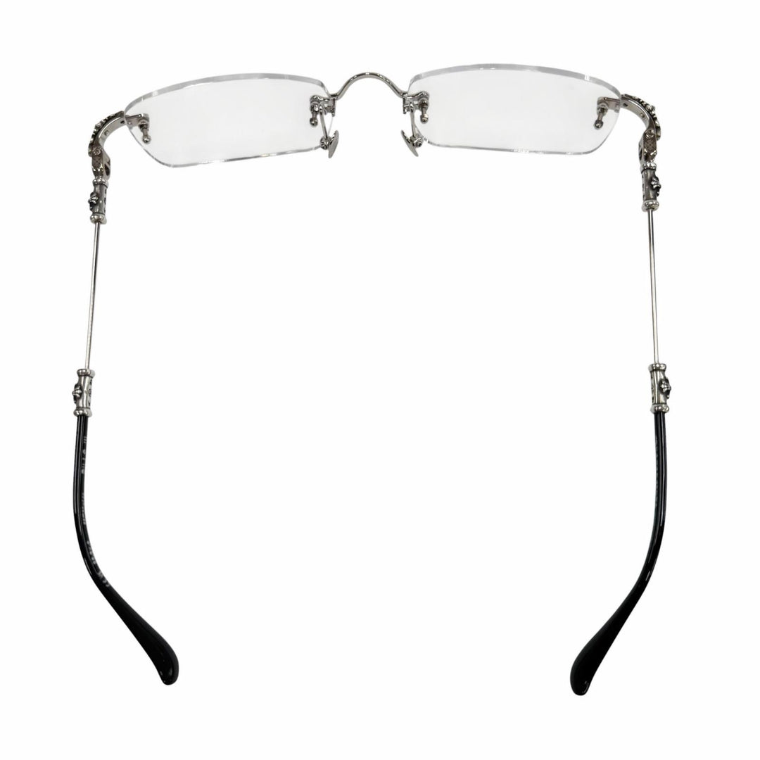 Eyeglasses with decorative arms on a white background