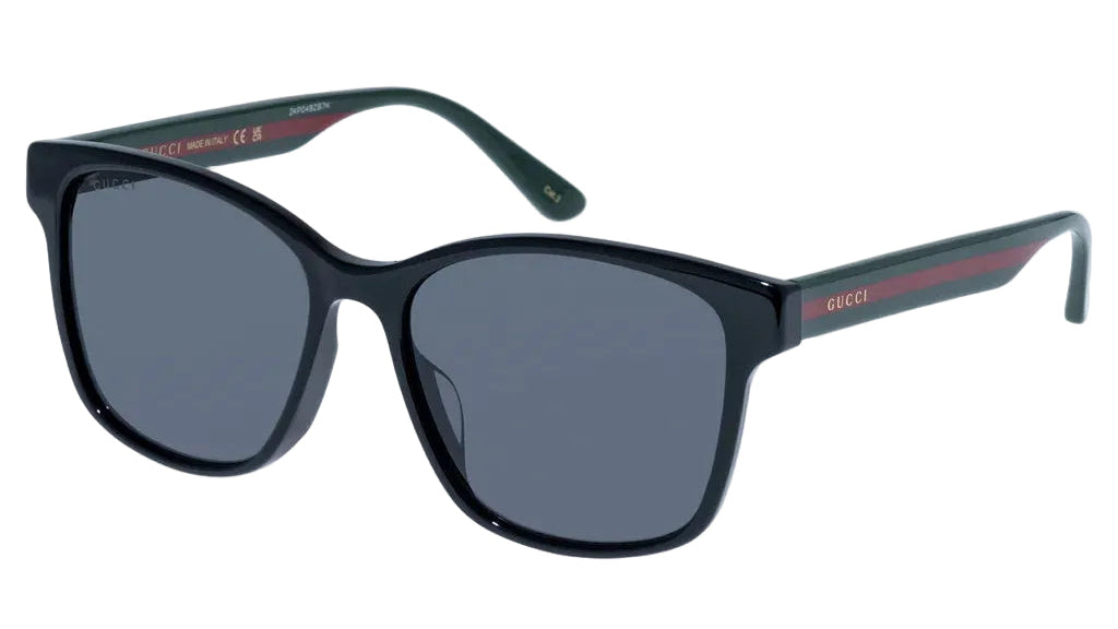 Black sunglasses with red accents on a white background