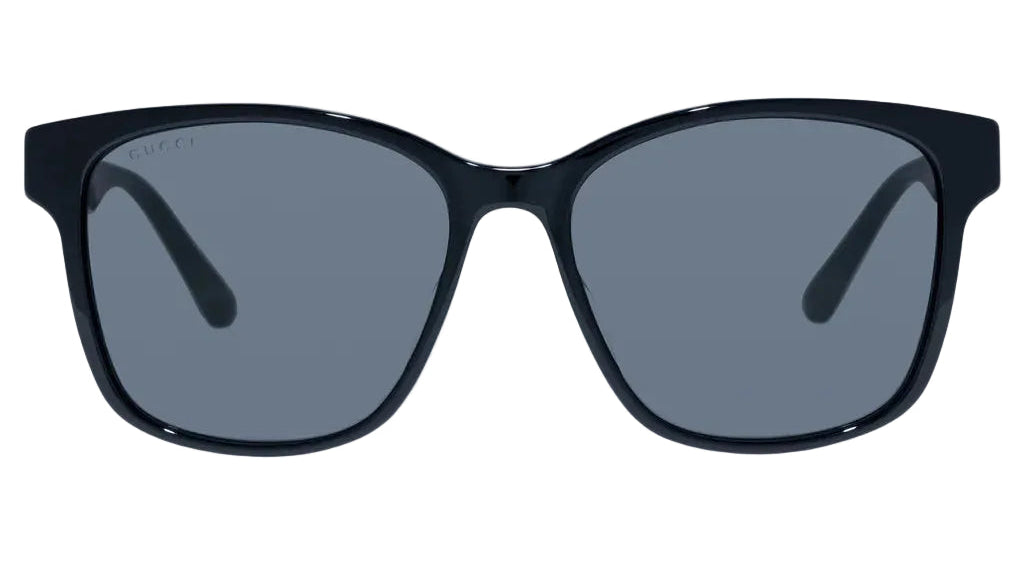 Black sunglasses with dark lenses on a white background